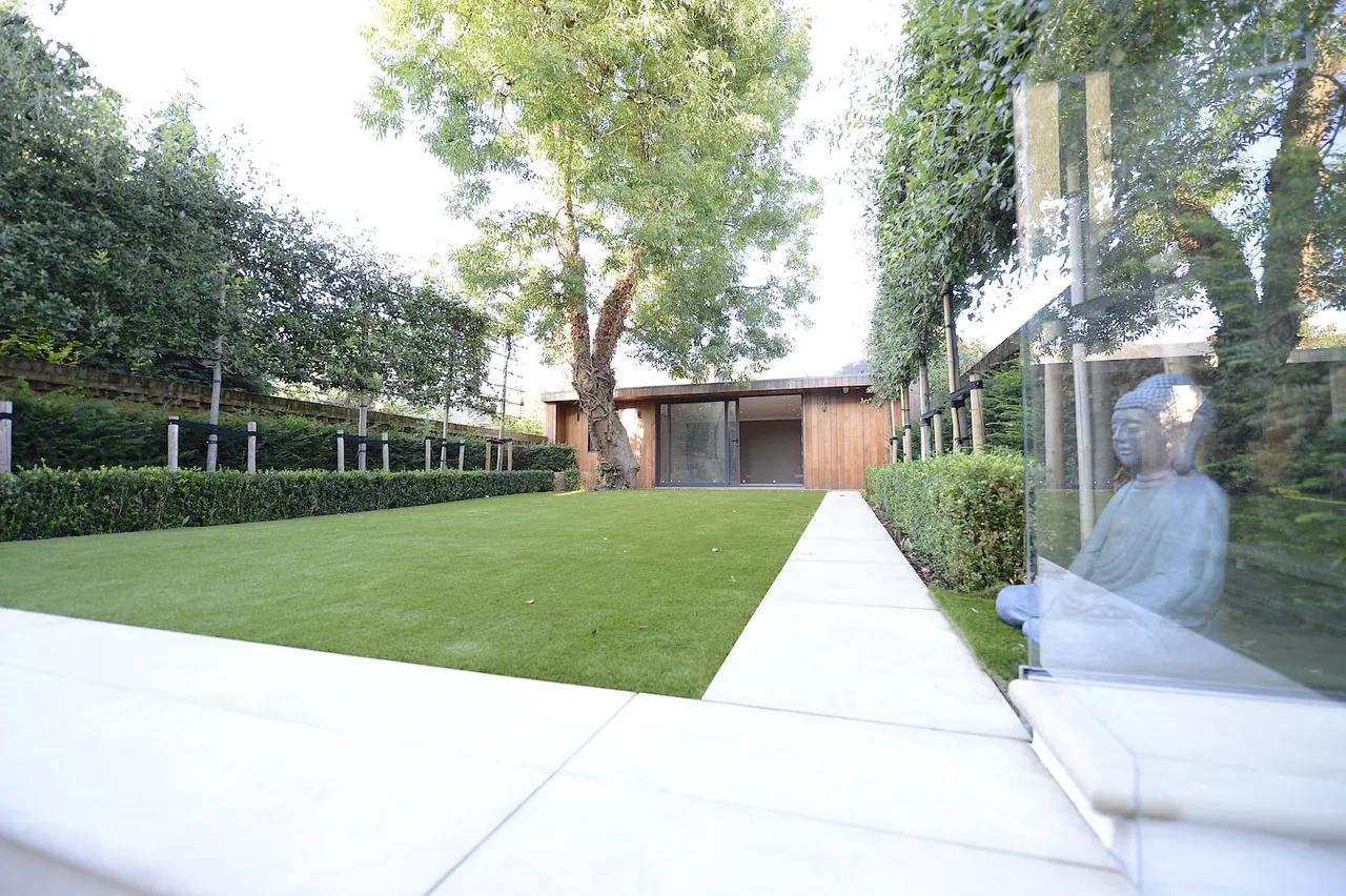 The garden, with the new garden building at the far end