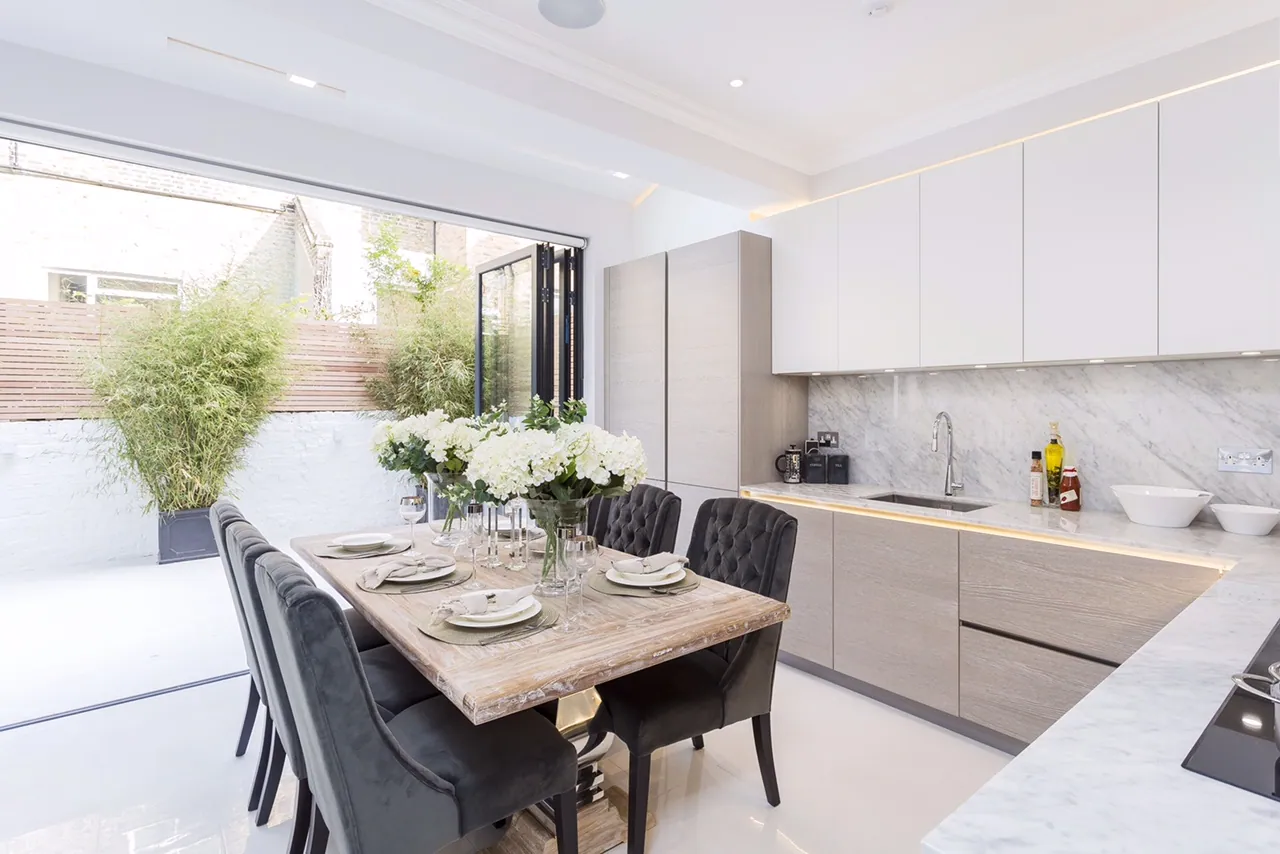 Open-plan kitchen and dining room at garden level