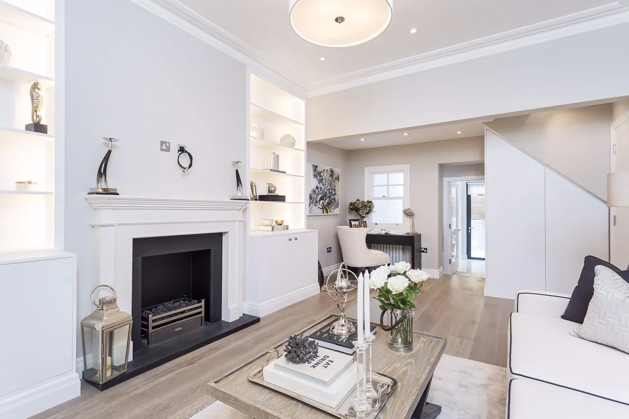 Reception room with restored chimneypiece and fitted alcove joinery